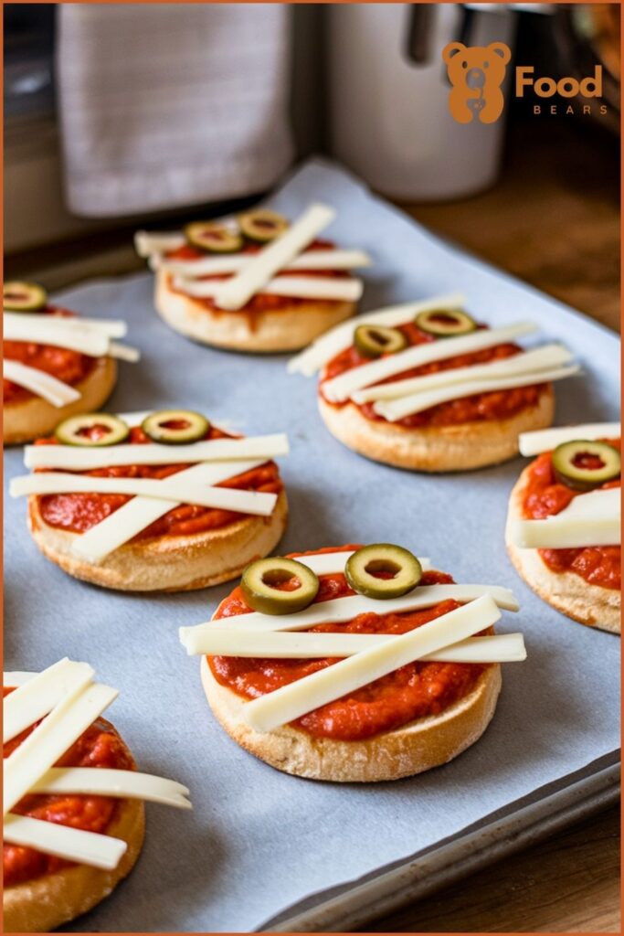 Halloween Pizza Ideas - Mummy Mini Pizzas